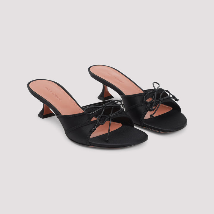 Amina Muaddi Mules - Black | e0539046c707d176ca1280658fc7576dc3ccce28