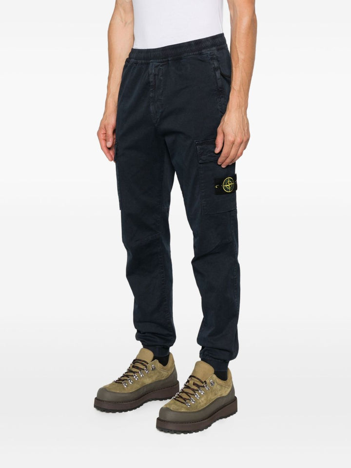 Stone Island Trousers - Blue and green | b23e9dca5a933a16afcccbf18bf11db68b680469