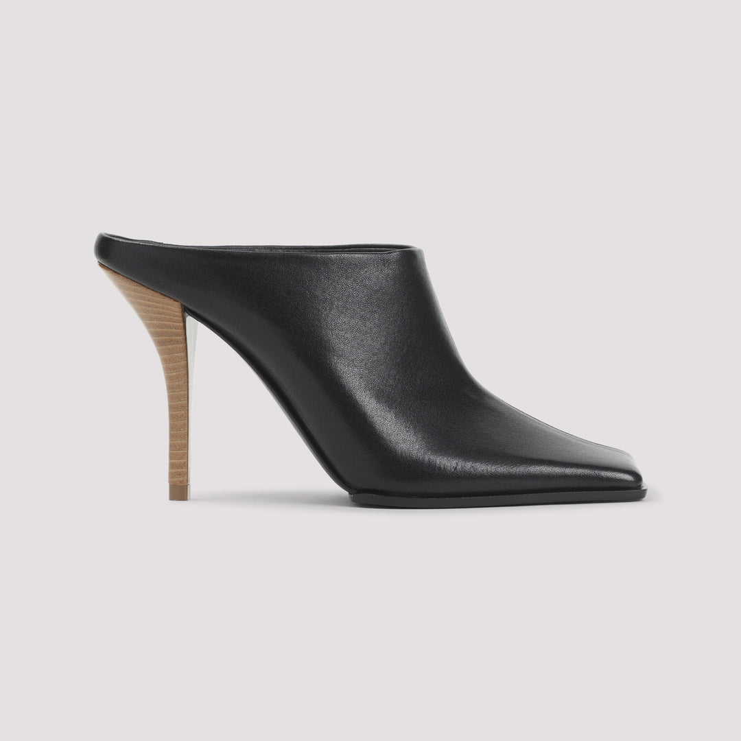 AlaÏA Mules - Black | ac1e4599beba2708a0b2683cb6ef826c8f8e3d23