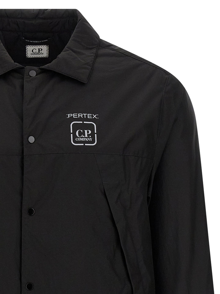 C.P. Company The Metropolis Series Puffer Jackets - Black | 36e491265b0f8a647fba3d52072fbf21f017fa03