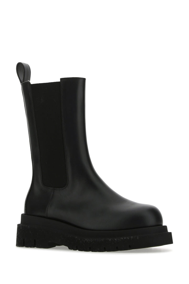 Black leather Lug ankle boots