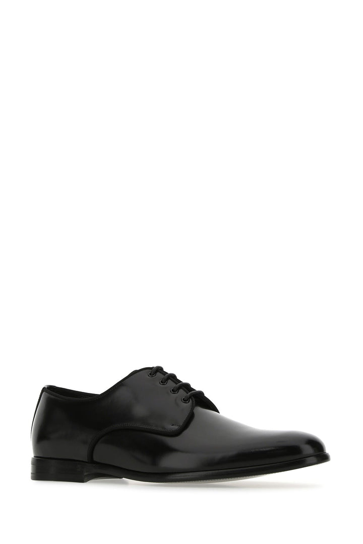 Black leather lace-up shoes