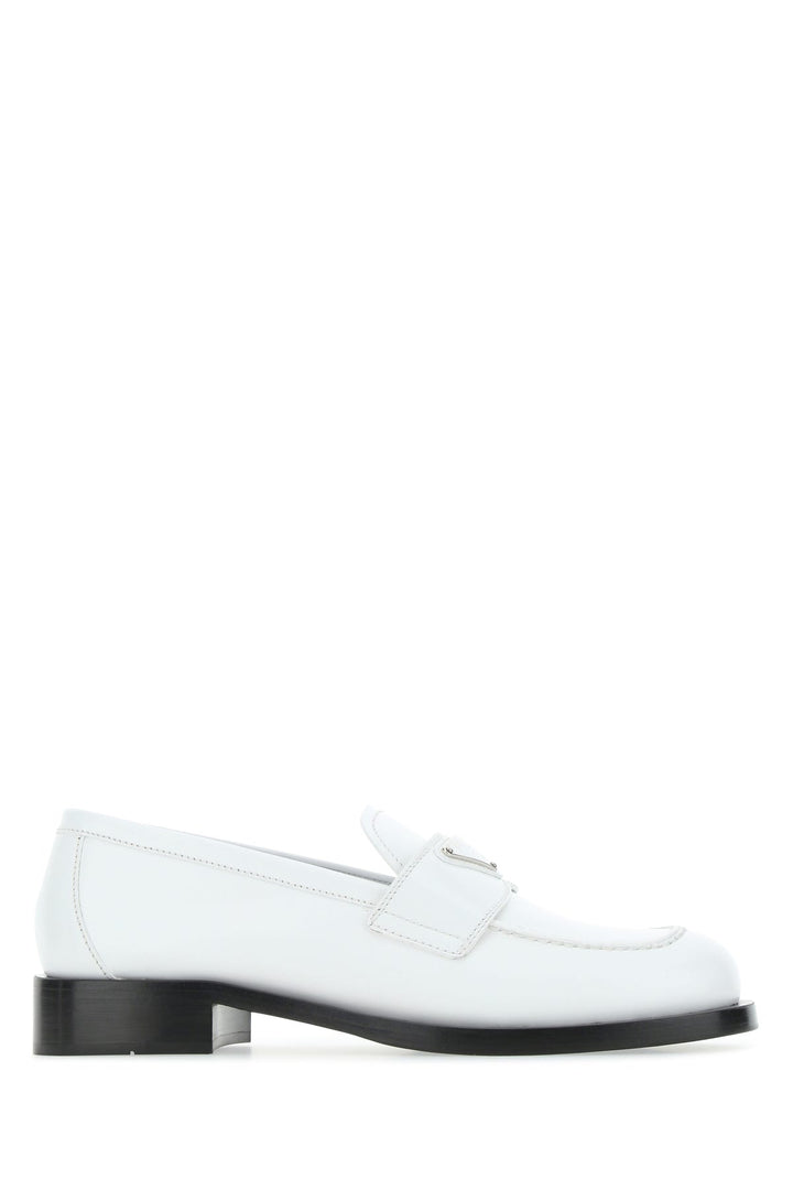 White leather loafers