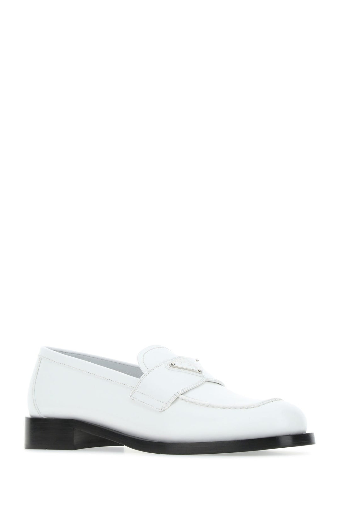 White leather loafers