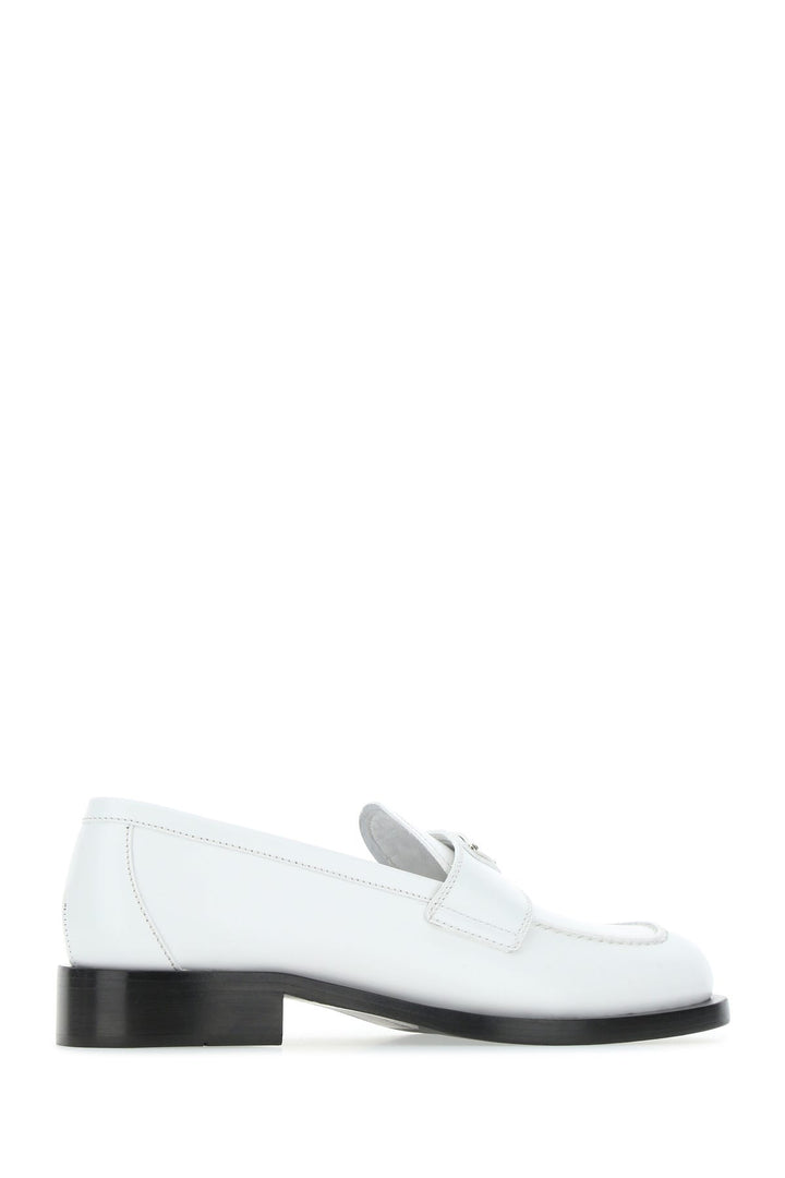 White leather loafers