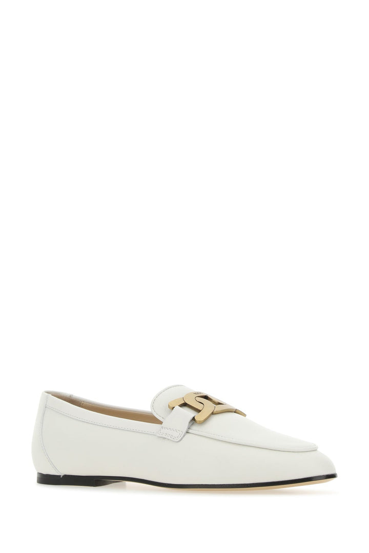 White leather loafers