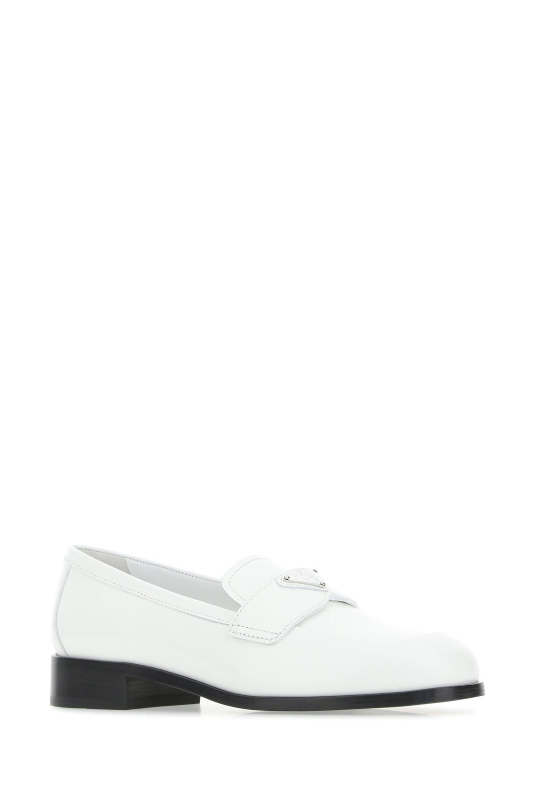 White leather loafers