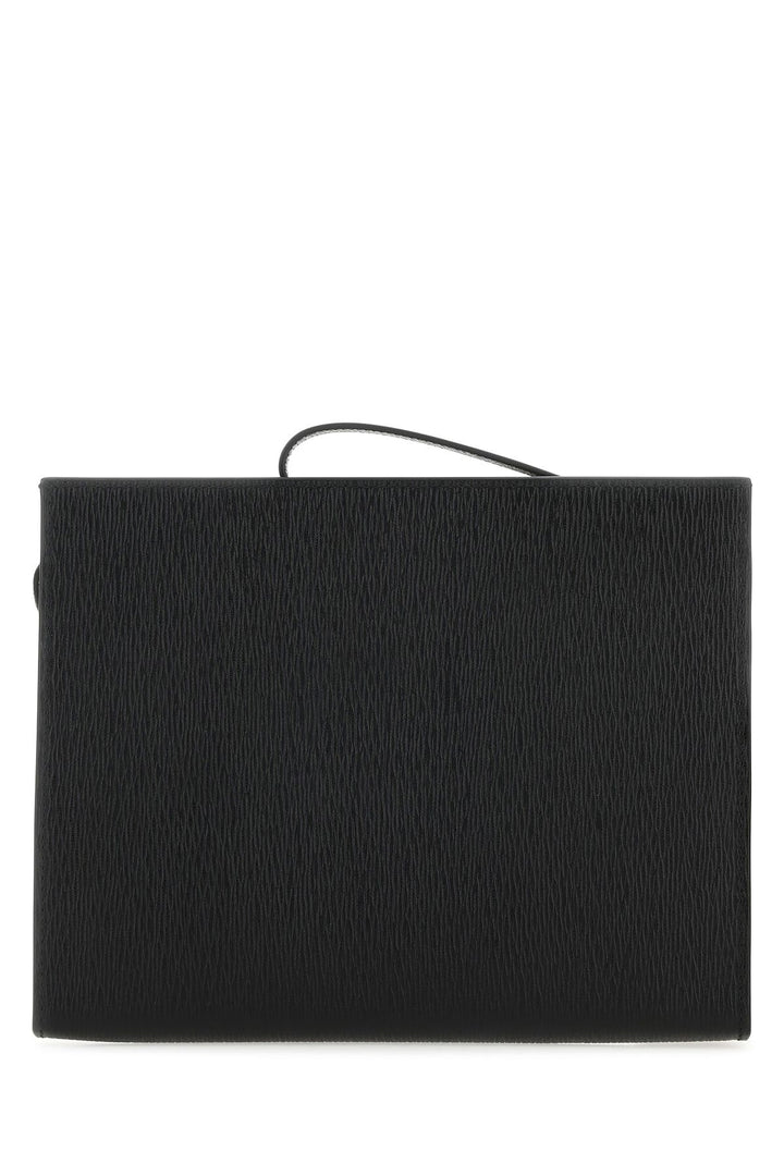 Black leather clutch