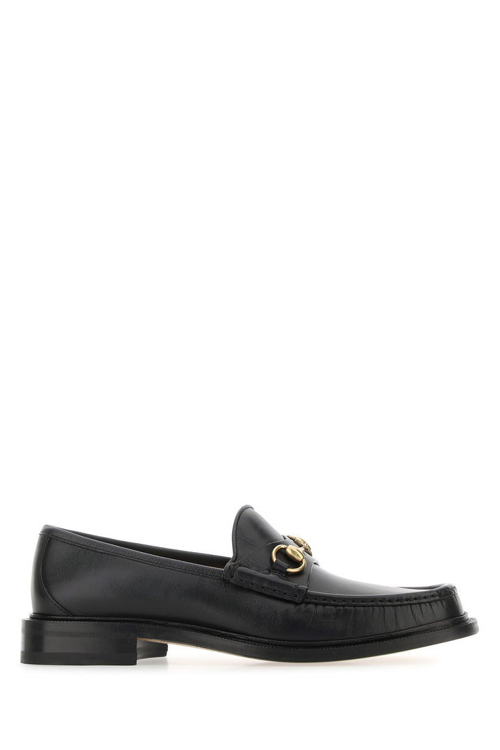 Black leather loafers