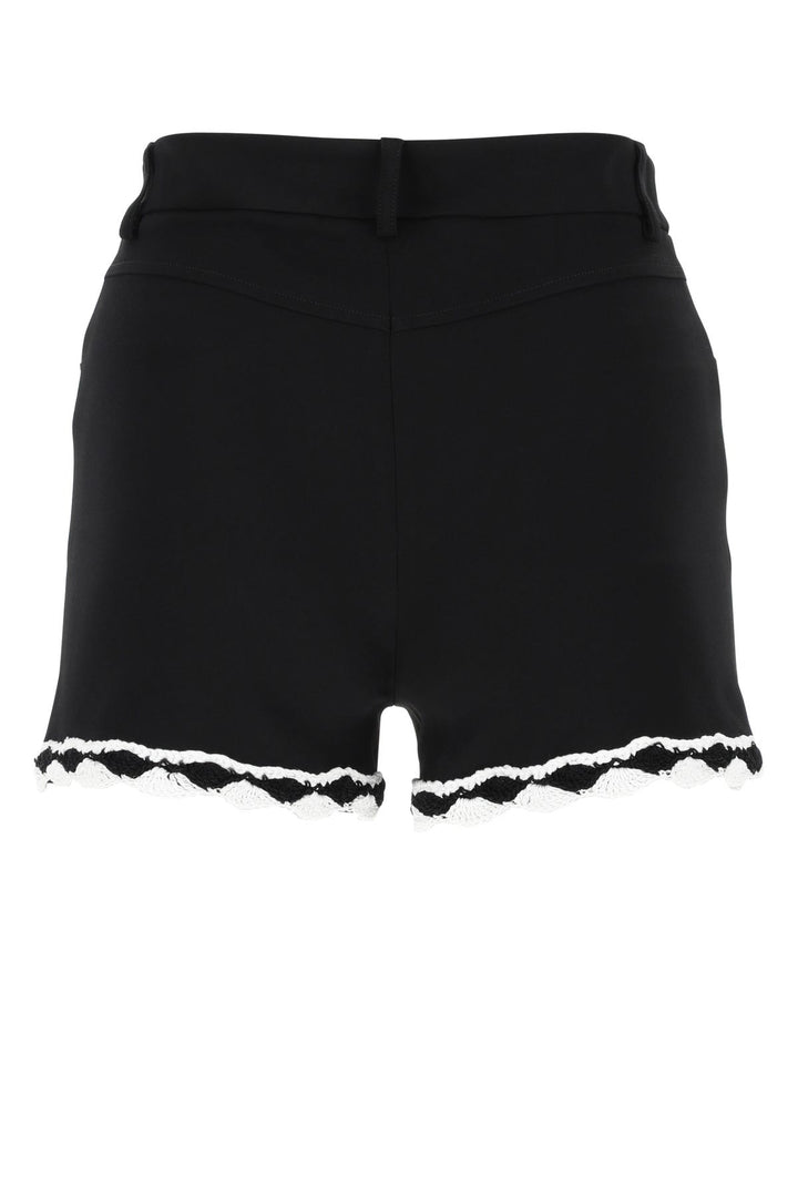 Black stretch crepe shorts