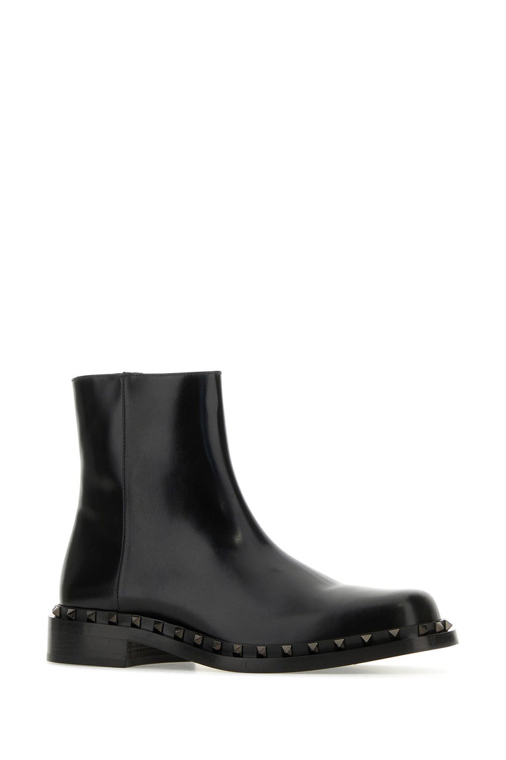 Black leather ankle boots