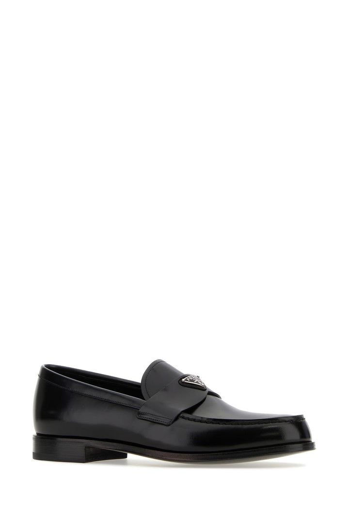 Black leather loafers