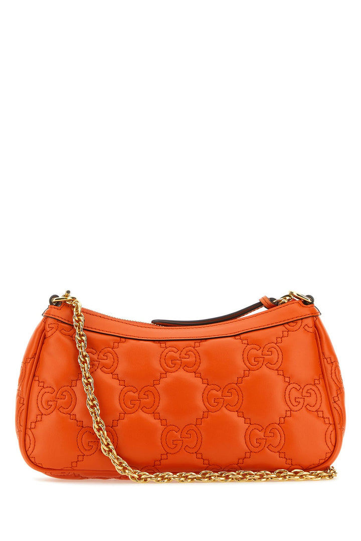 Orange leather handbag