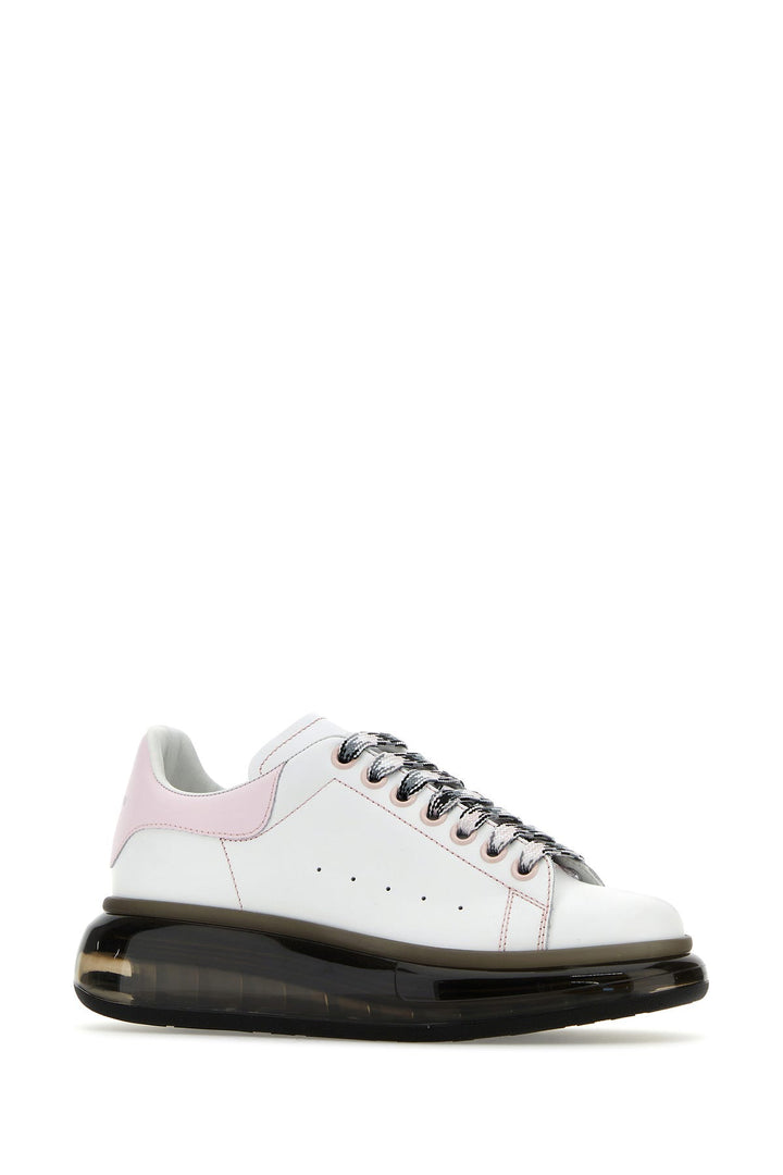 White leather sneakers with pink leather heel