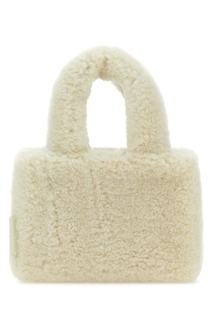 Ivory shearling Amini Giuly handbag