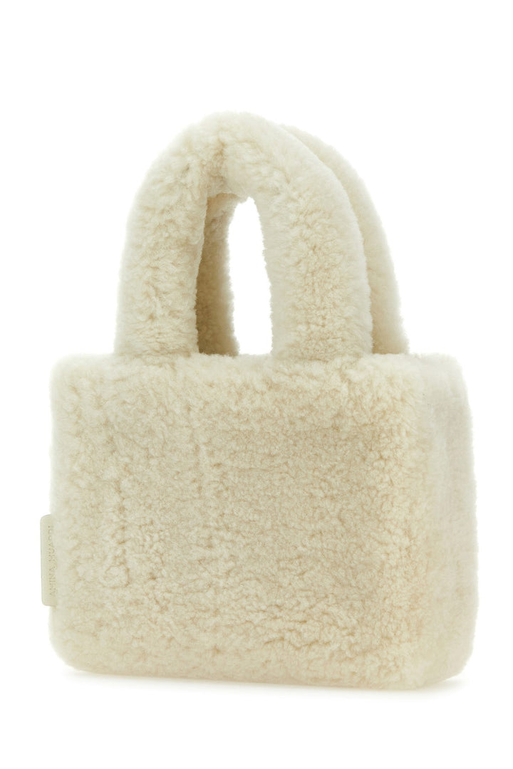 Ivory shearling Amini Giuly handbag