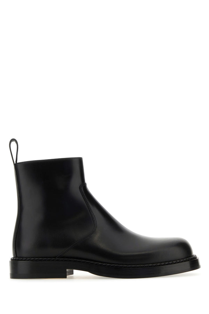 Black leather Strut ankle boots