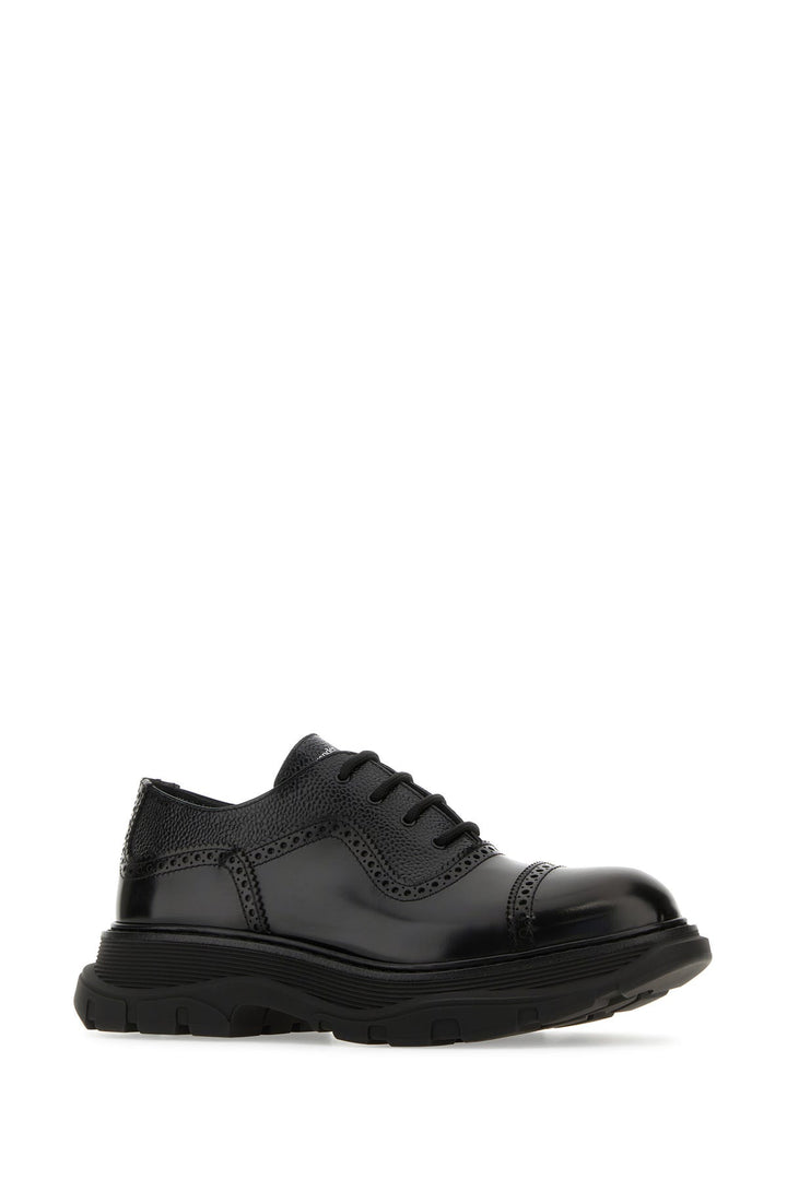 Black leather lace-up shoes