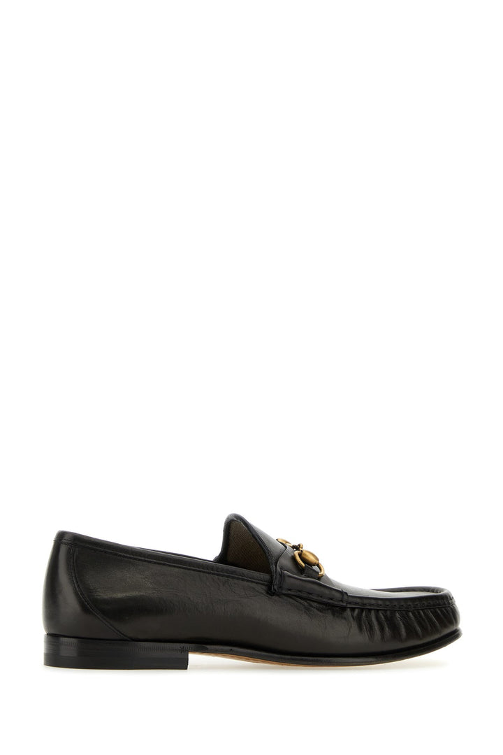 Black leather loafers