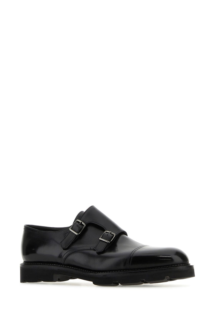 Black leather strap shoes