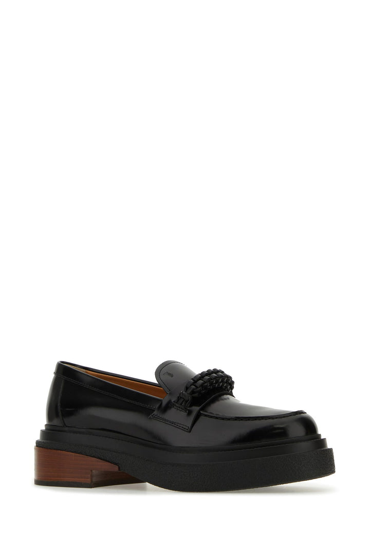 Black leather loafers