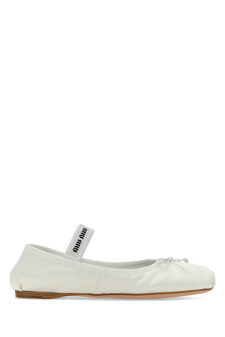 White satin ballerinas