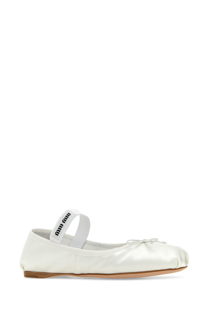 White satin ballerinas