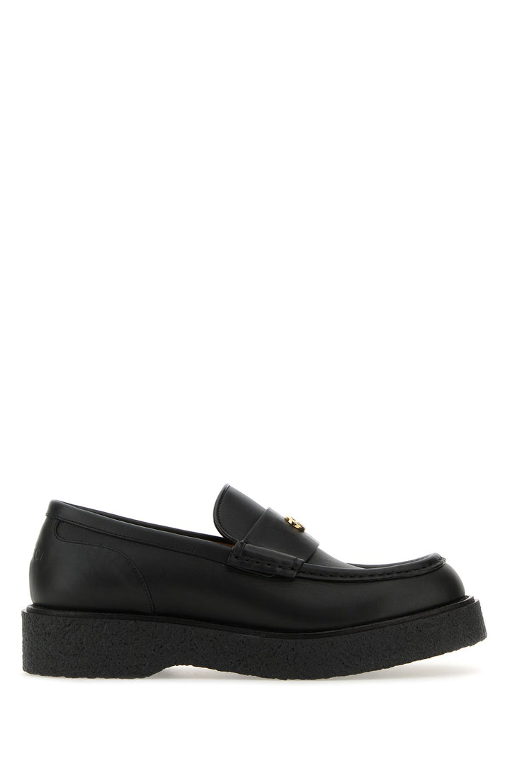 Black leather loafers