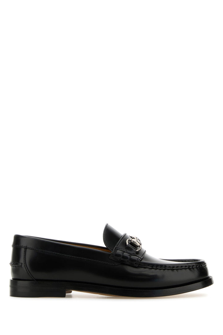 Black leather loafers