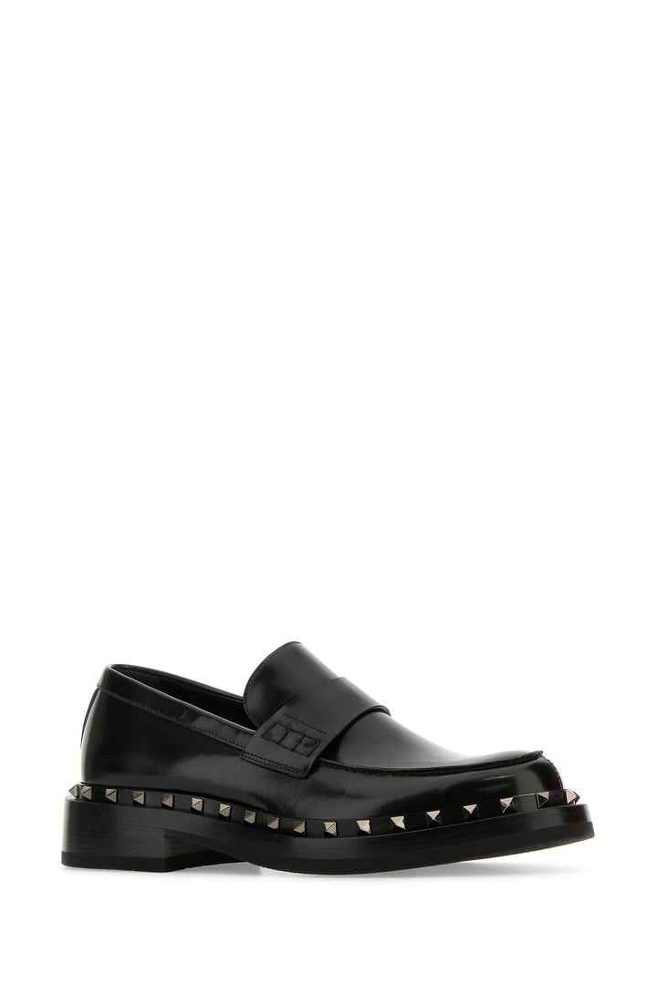 Black leather Rockstud loafers