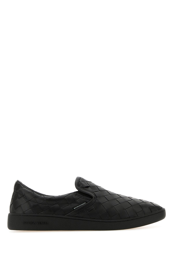 Black leather Sawyer slip ons