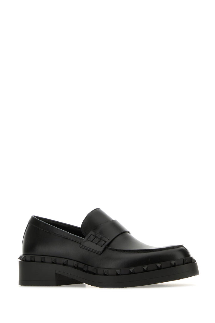 Black leather Rockstud loafers