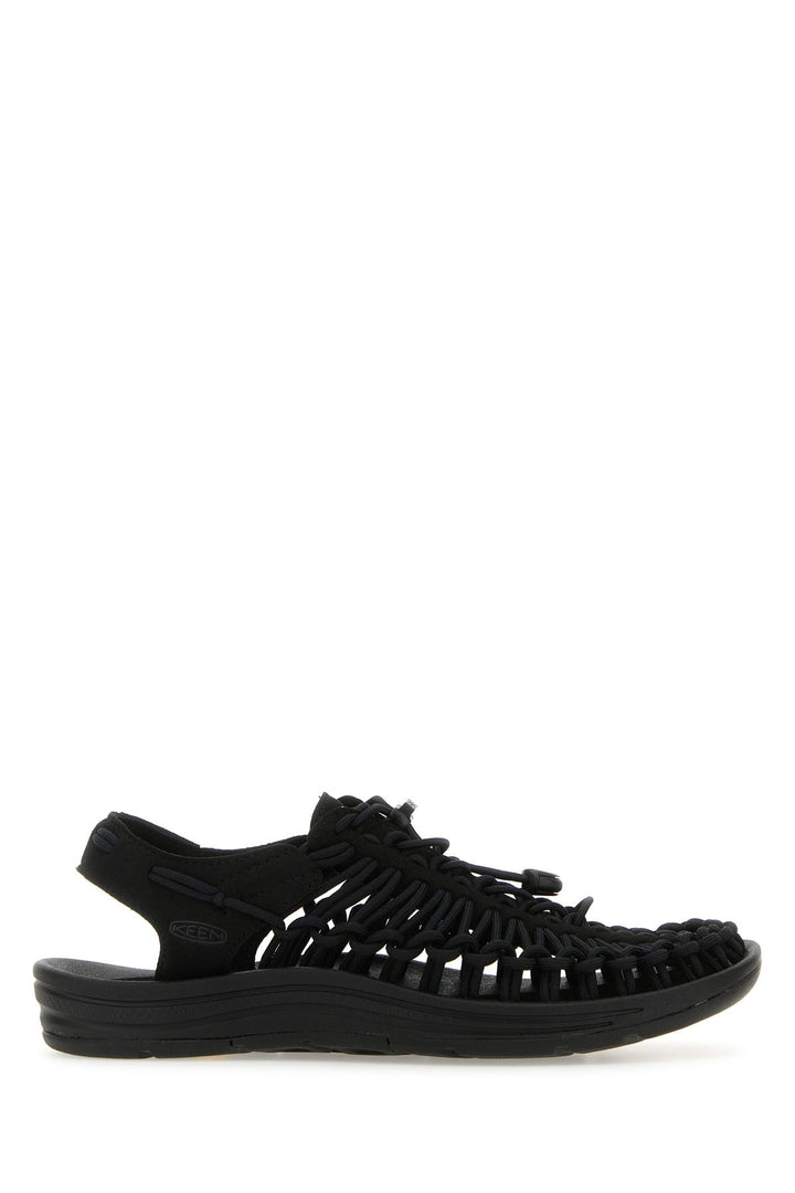 Black fabric Uneek sneakers