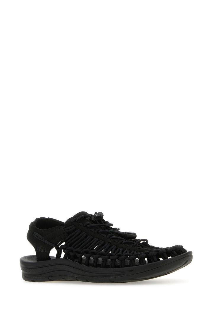 Black fabric Uneek sneakers