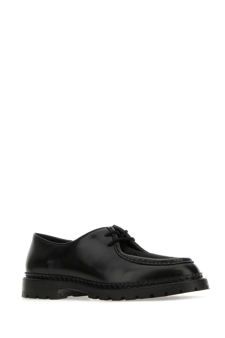 Black leather and calf hair lace-up shoes