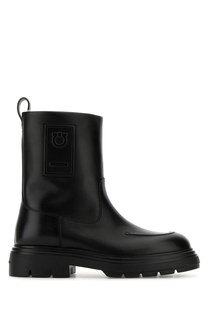 Black leather Tirba ankle boots