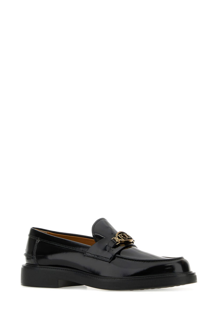 Black leather loafers