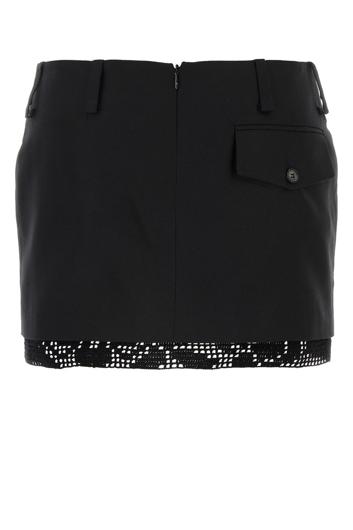 Black silk mini skirt