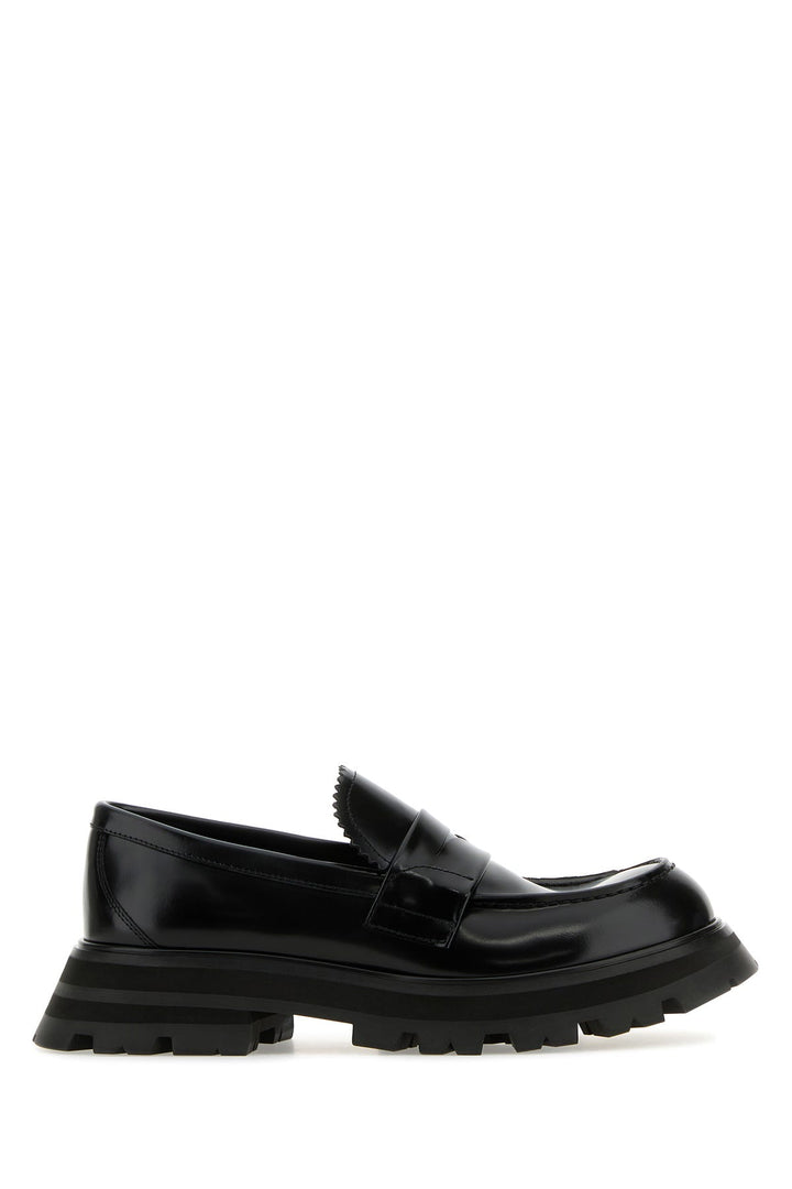 Black leather loafers