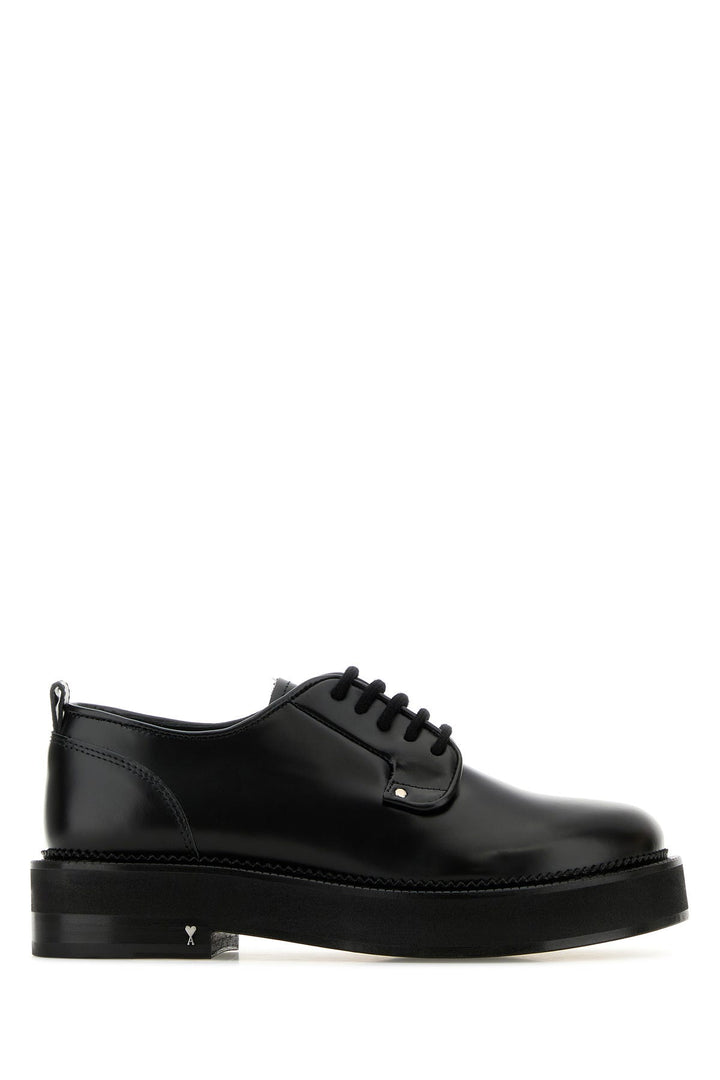 Black leather lace-up shoes