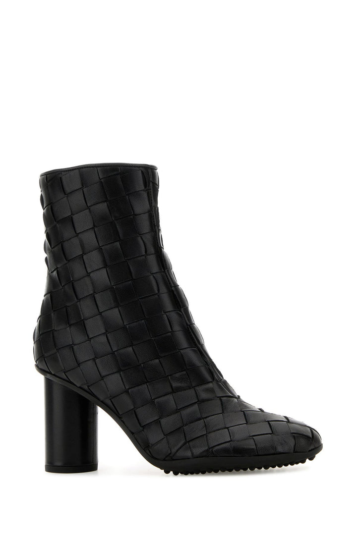 Black leather Atomic ankle boots