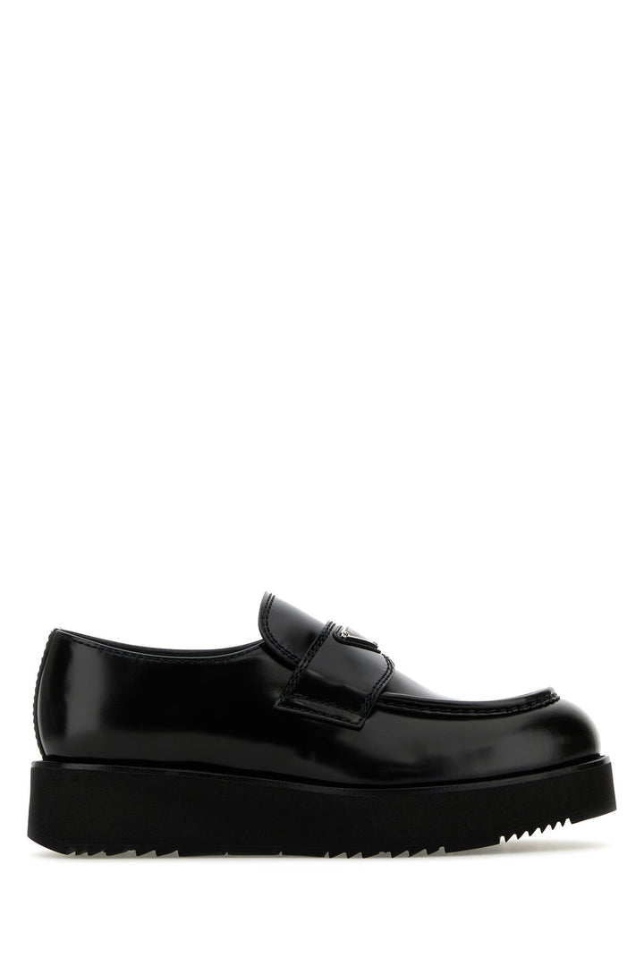 Black leather loafers