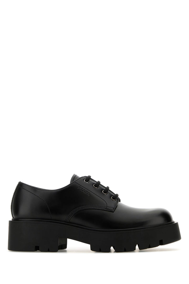 Black leather lace-up shoes