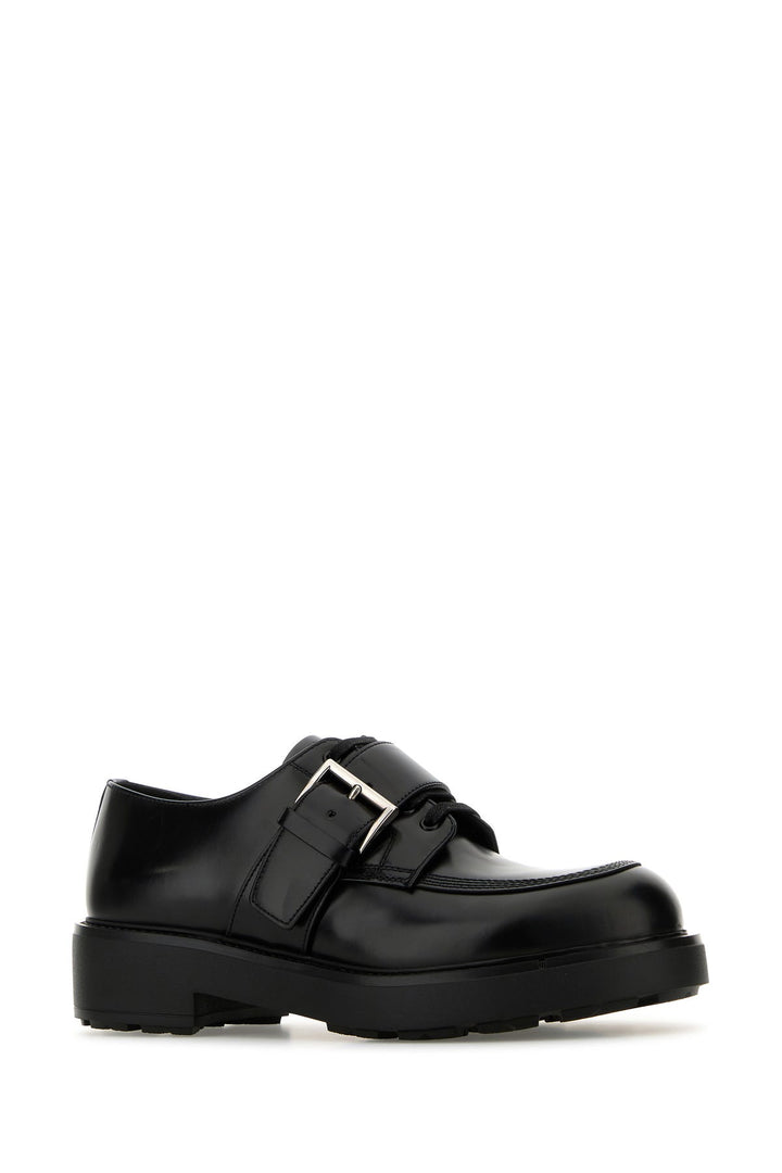 Black leather lace-up shoes