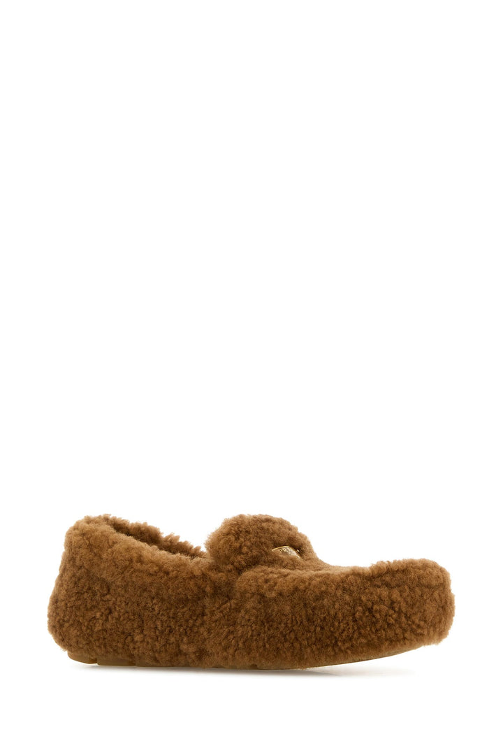 Caramel shearling loafers