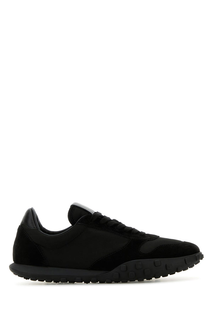 Black fabric and suede sneakers