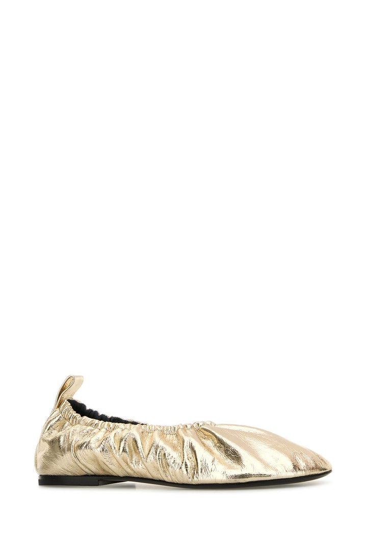 Gold leather ballerinas