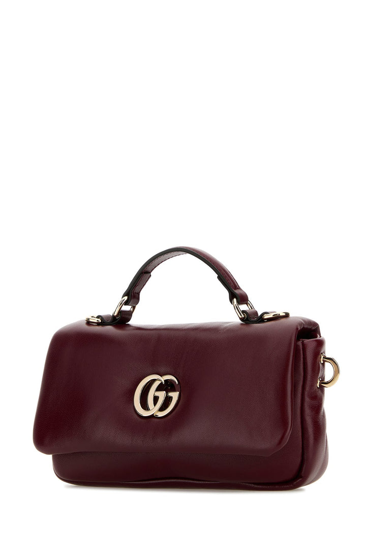 Burgundy leather handbag