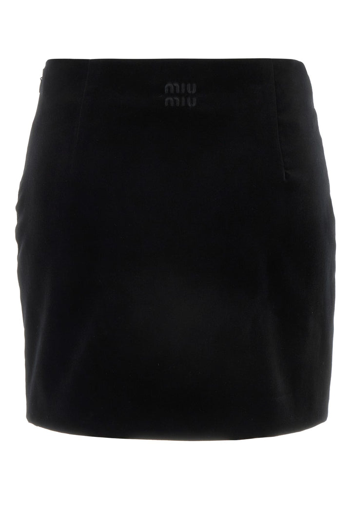 Black stretch velvet mini skirt