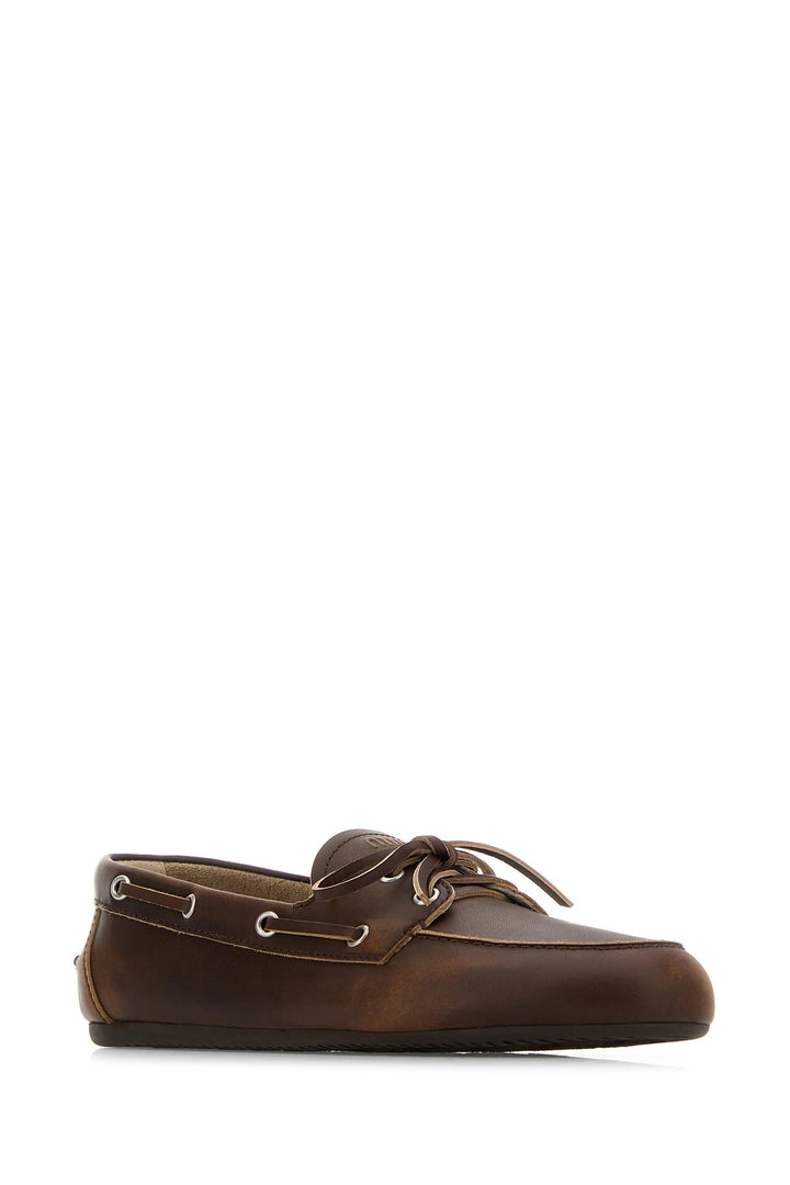 Brown leather loafers